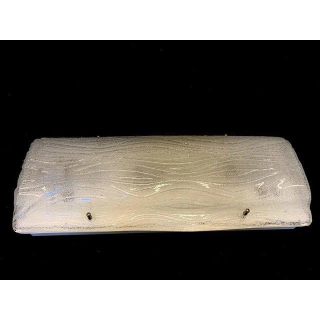 Single Applique of Murano attributed Mazzega company \. Around 1980. Transparent handmade glass pasta, worked with a...