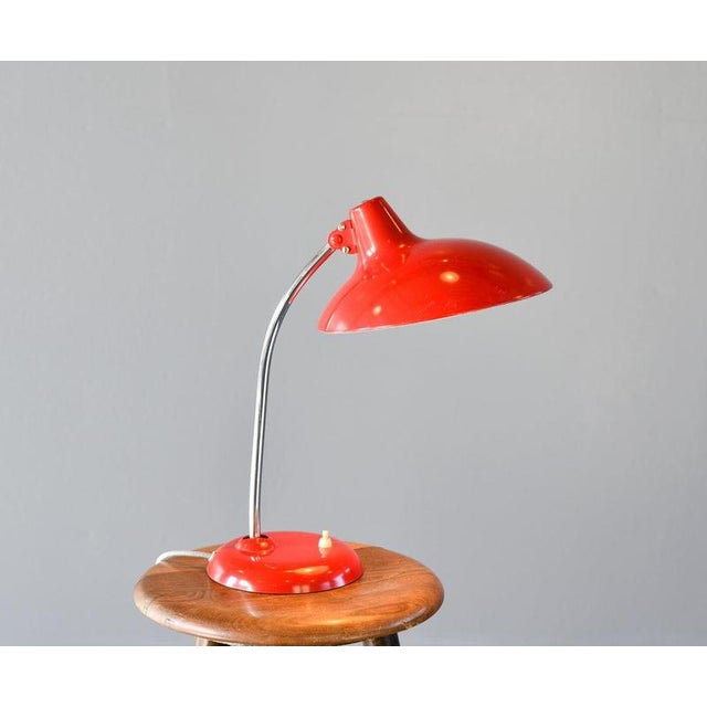 Mid Century Table Lamp By Kaiser Leuchten Model 6786 Circa 1950s Steel shade and base - Chrome arm - Original red paint -...
