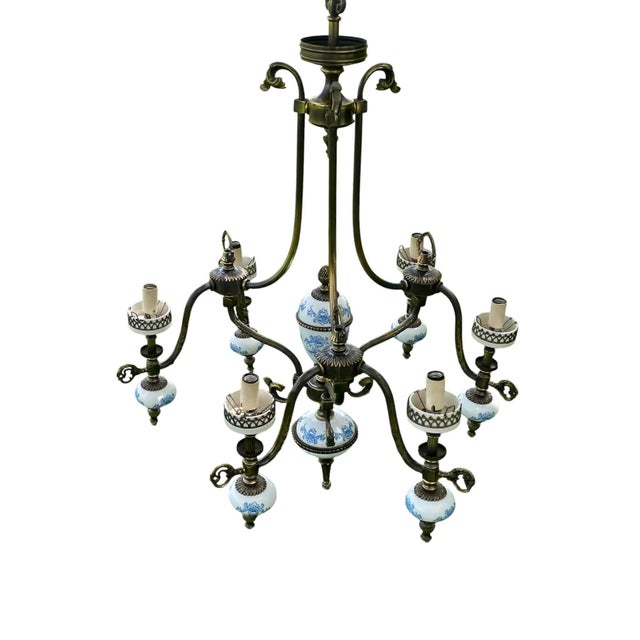 Stunning Vintage Porcelain and Brass Chandelier. From ceiling cap to bottom point of chandelier is 40", width is 23" All...