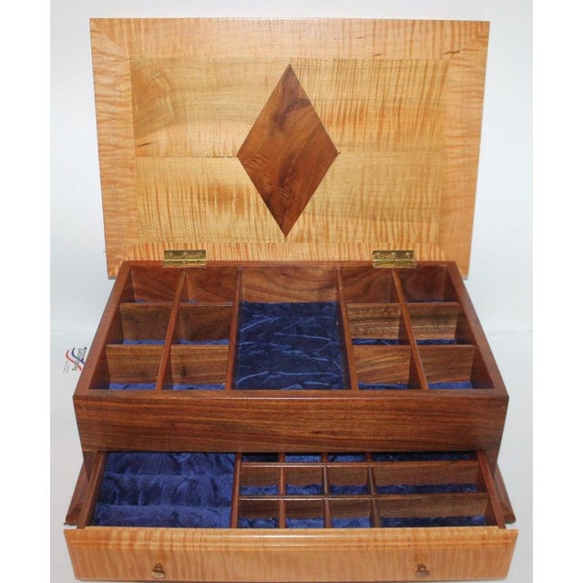 Handmade walnut and tiger eye maple silver chest with drawer. This is more contemporary handmade chest with a lift top.