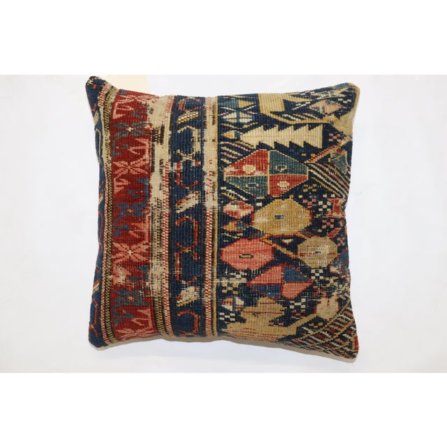 Pillow made from a 19th-century Caucasian rug with cotton back and zipper closure included. Measures: 15'' x 15''.