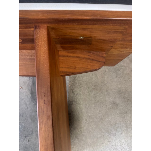 Large Vintage Danish white leather and teak wood bench. Dimensions: H 18.5” x W 98”x D 15”. Condition:Great used condition.