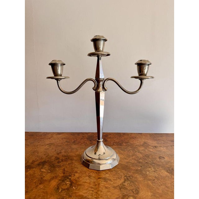 Fine quality pair of antique Edwardian silver plated candelabras, having a quality pair of three branch silver plated...