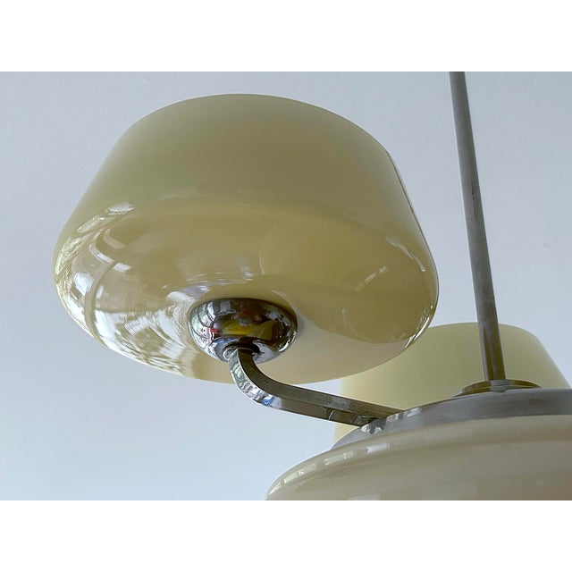Large Art Deco pendant light featuring a nickel plated structure and ivory color glass shades Total Height 85 cm / 33.46...