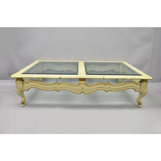 Vintage French Provincial Style Beveled Glass Cream Painted Large Coffee Table. Item features a very large impressive...