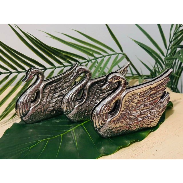 A beautiful vintage silver plated swan to hold your mail or favorite notes, perfect for a gift, if needed we have 3...