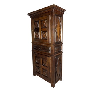 Early 20th Century Spanish Renaissance Style Walnut Cabinet with Geometric Carve For Sale