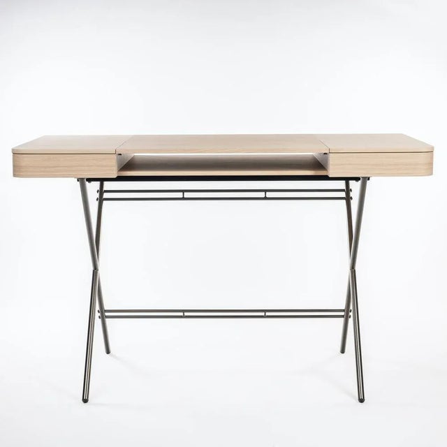 The Cosimo desk was designed by the architect Marco Zanuso Jr for luxury French furniture brand, Adentro Paris. The...