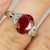 Platinum & 18k Ring with one 3.09 carat AGL certified ruby and 2 half moon diamonds weighing 0.78 carats. 7.90 grams.