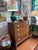 A handcrafted walnut chest from early North Carolina, showcasing the refined joinery and warm patina characteristic of...