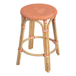 Tobias 24 in. Seat Height Round Rattan Backless Counter Stool, Orange/White Dot/ Natural Rattan Frame For Sale