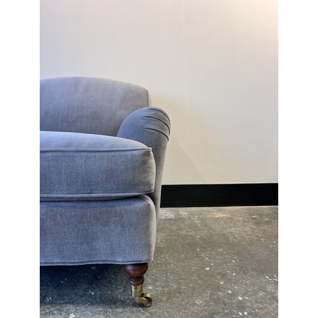 Ralph Lauren English Roll Arm Chair upholstered in Graphite Linen Velvet Fabric with Welt. Turned front legs with antique...