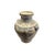 This vintage ceramic vase showcases a charming blend of rustic appeal and artistic expression. The light tan or cream base...