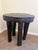 A remarkable antique hand-carved wood and iron side table dating to the early 20th century. Constructed from substantial...