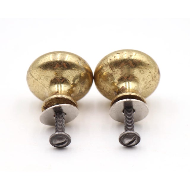 Vintage Classic cabinet or drawer knobs made of brass with a polished finish. Mounting screws are included. Good condition...