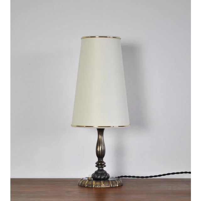 Art Nouveau table lamp early 20th century, probably Danish. Fine vintage condition with a beautiful patination, signs of...