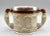 Large antique English salt glazed hunting cup with handles in the form of whippet dogs. It has been embellished at the top...