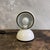 This eclisse table lamp, designed by vico magistretti and produced by artemide in 1965, represents a significant piece of...