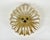 Elevate your interior with this breathtaking vintage ceiling chandelier, a true masterpiece of 1960s german craftsmanship....
