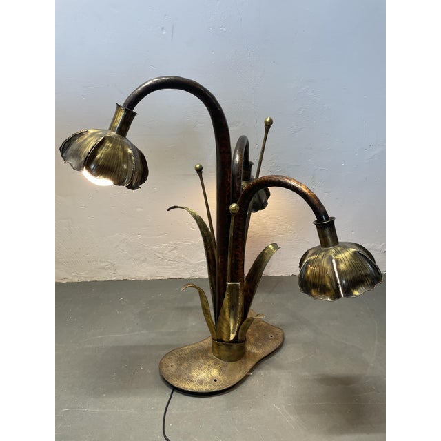 Unfortunately, I haven't been able to find out who the designer/manufacturer of this unique, extravagant lamp is. Its...