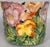 Presenting an Italian made floral cachepot to warm your space with a reminder of spring! Full of vibrant color and Trompe...