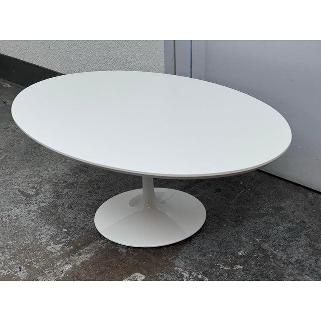 Design Plus Gallery presents an Italian Saarinen Style Coffee Table from Alivar. This oval coffee table showcases a white...