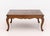 French Provincial Oak Coffee Table, with parquetry design to the top above cabriole legs. 17" H x 37.75" H x 38.25" D....