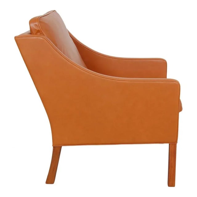 Børge Mogensen Lounge chair model 2207. The chair has been reupholstered with new leather, and with new cushions. Designer...