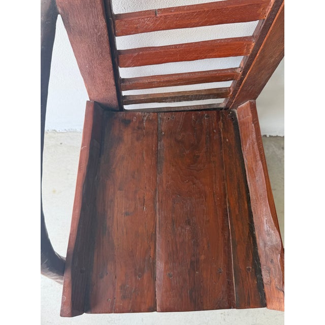 Artisan made handmade heavy teak accent chair. Folk art. Tall ladder back style. Perfect statement accent chair. Brutalist...