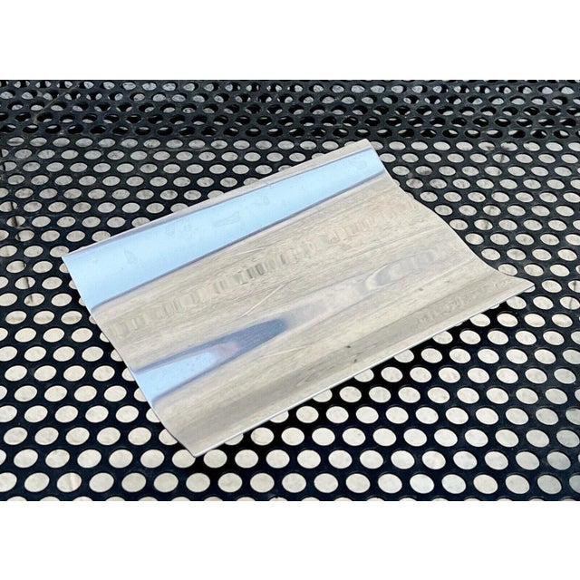 Measurements: 7” x 5” From the WAVE line in 1992 by Georg Jensen for Royal Copenhagen. Made of stainless steel and in...