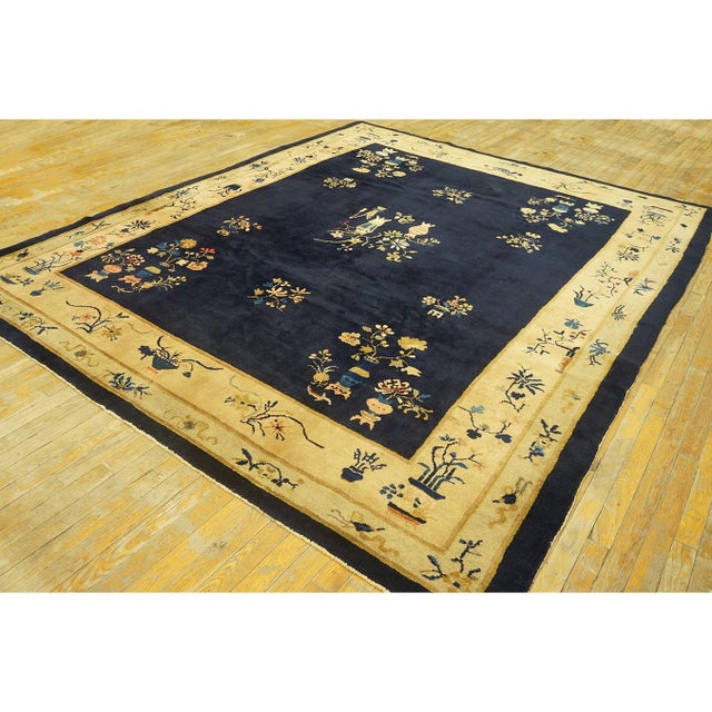 Wool Rectangle 1920s Hand Knotted Pile Blue Ivory Beige Cream White Antique Rug, Circa Date: 1920s. This exceptional piece...