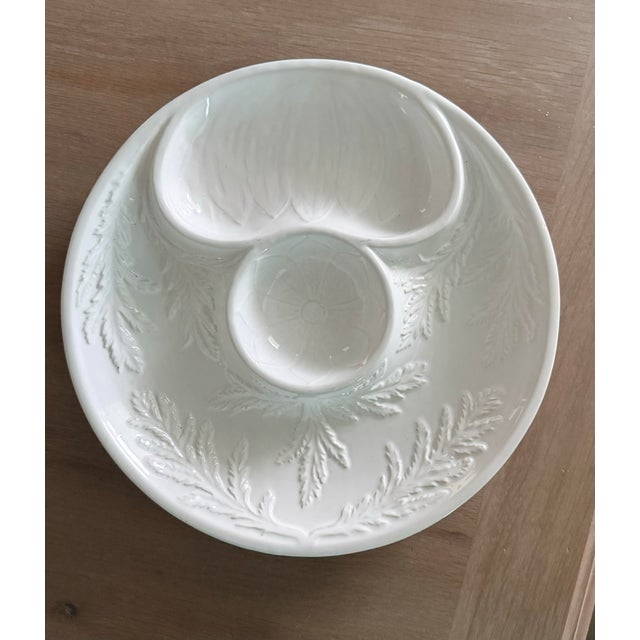 Made in portugal by Bordallo Penheiro this white artichoke platter will add elegance to any table.
