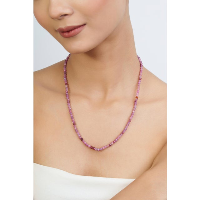 Add a refined touch of color to your jewelry collection with this elegant necklace featuring 53 carats of natural pink...