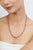 Add a refined touch of color to your jewelry collection with this elegant necklace featuring 53 carats of natural pink...