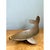 This vintage sculptural dish takes the whimsical form of a stylized whale, its body gracefully curved into a shallow,...