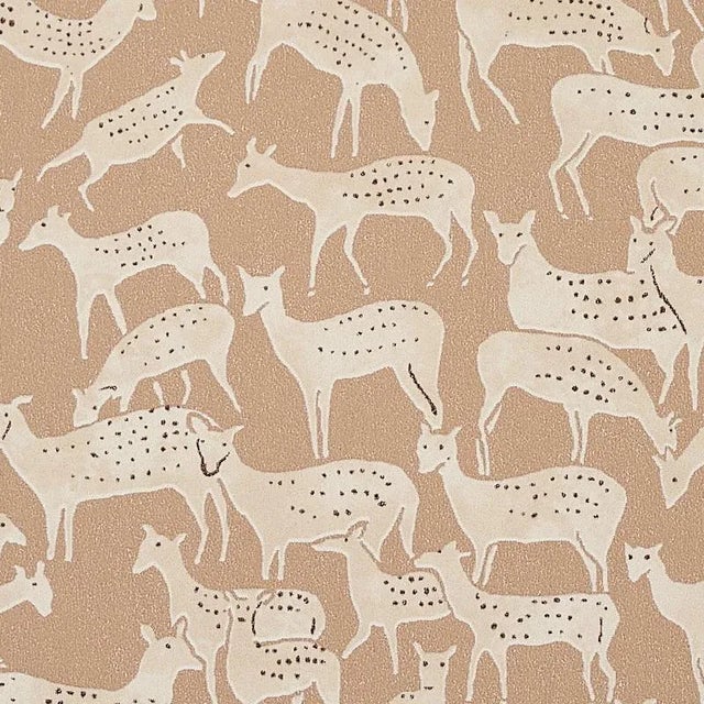 Miniature herds of hand-drawn deer, each with a distinct expression, give this small-scale wallpaper design unique,...