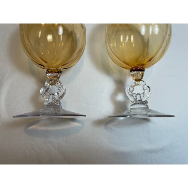 Pair of Light Amber tinted Cambridge, Depression Era Footed, Ribbed Ivy Ball Vases. Clear, keyhole stems. One of them has...