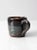 This is a vintage studio pottery mug. Signed by the artist, the handmade mug has a beautiful blue and dark brown drip...