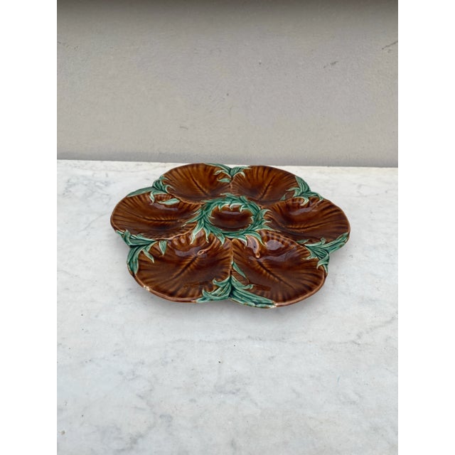 19th Century Majolica chocolate oyster plate with green seaweeds Luneville. Reference: Page 43 "Oyster plates" of J....