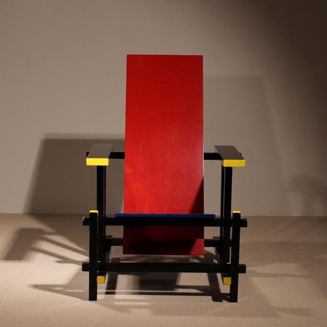 A modern icon: the Red and Blue Chair, designed by Gerrit Rietveld in 1918. This piece is an early edition by Cassina from...