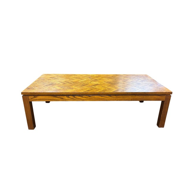 Bring warmth and timeless craftsmanship to your living space with this beautifully made Mid-Century Modern oak coffee...