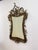 An extraordinary Swedish Art Nouveau mirror, circa 1890, featuring an exuberant arrangement of sculptural foliage, sinuous...