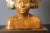 Bust with the image of a Balinese dancer in polychrome ceramic, wooden base, Art Deco era, dimension without the height...