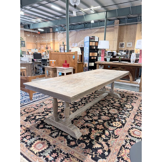A substantial vintage dining table that reflects Restoration Hardware’s signature interpretation of rustic European...