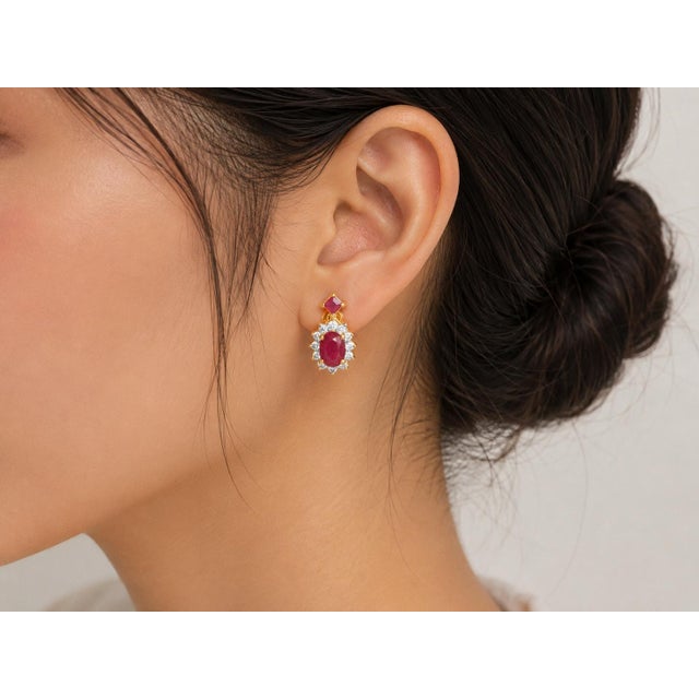 14K Yellow Gold Estate Diamond & Ruby Filigree Earrings. This elegant pair features 24 brilliant round white diamonds...