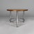 Italian Bauhaus round coffe table in wood and metal, 1930s Coffee table with round wooden top. The frame is made of...