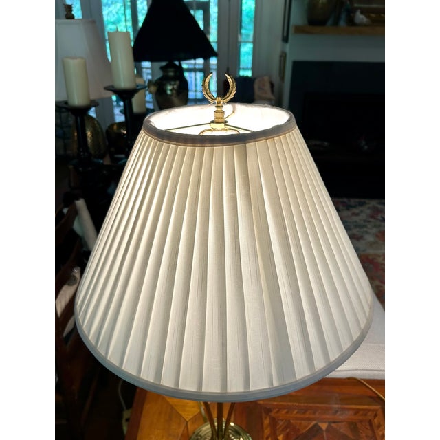 Offering two table lamps with pleated shades. Urn shaped crystal with brass trim. Excellent condition.