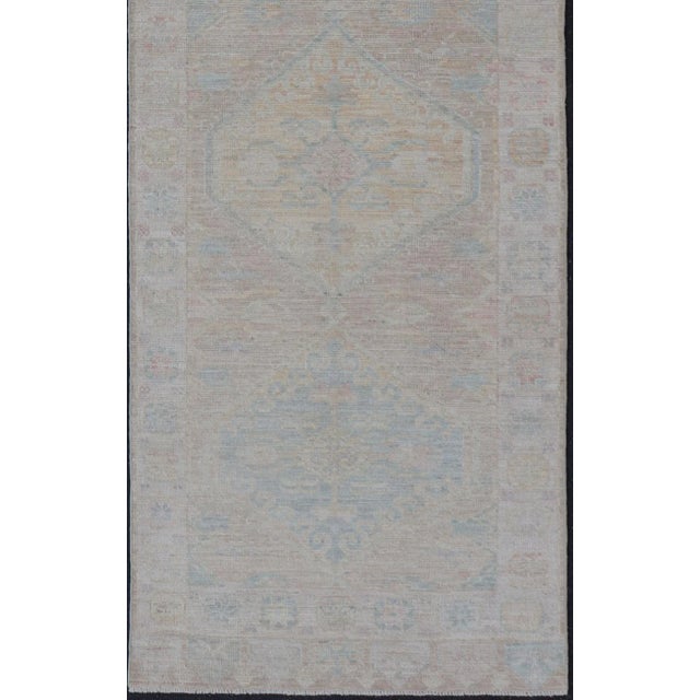 Hand Knotted Oushak with Light Coral and Blue Motifs on Light Taupe Background. Keivan Woven Arts: rug/ AWR-3511 Country...