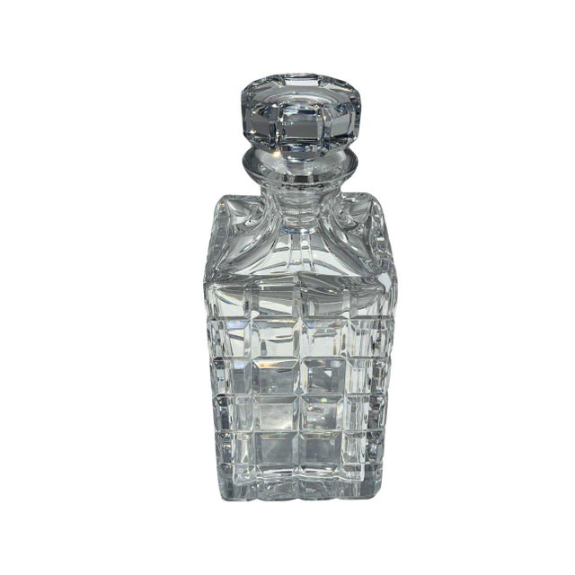 This substantial lead crystal decanter is attributed to Atlantis Crystal of Portugal and features a classic square...