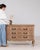 This nightstand makes its impression through natural bleached oak, cabriole legs, single door. The piece dates to 20th...